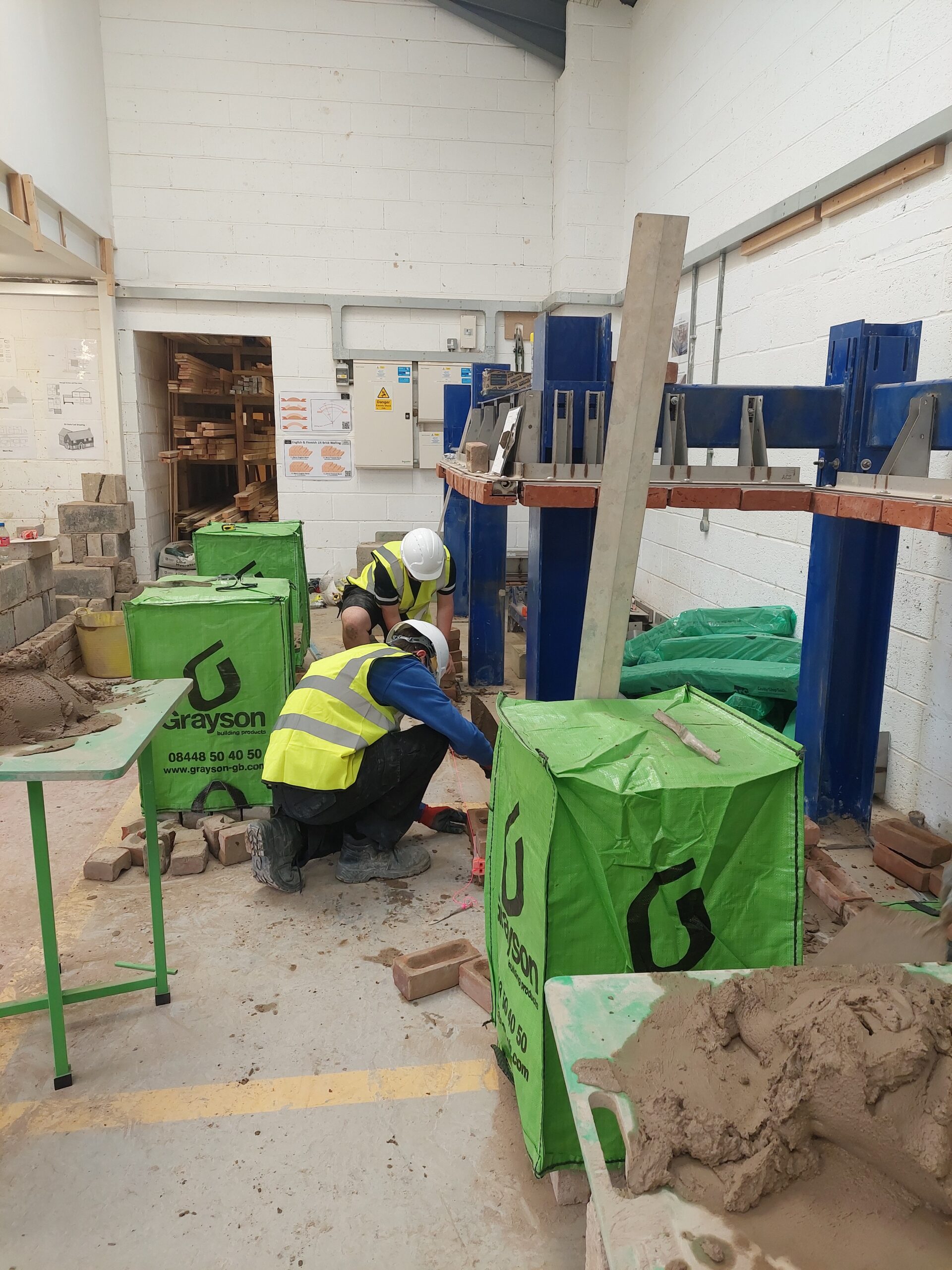 Brickwork Students Lay First Brick on New Cutting-Edge Rig